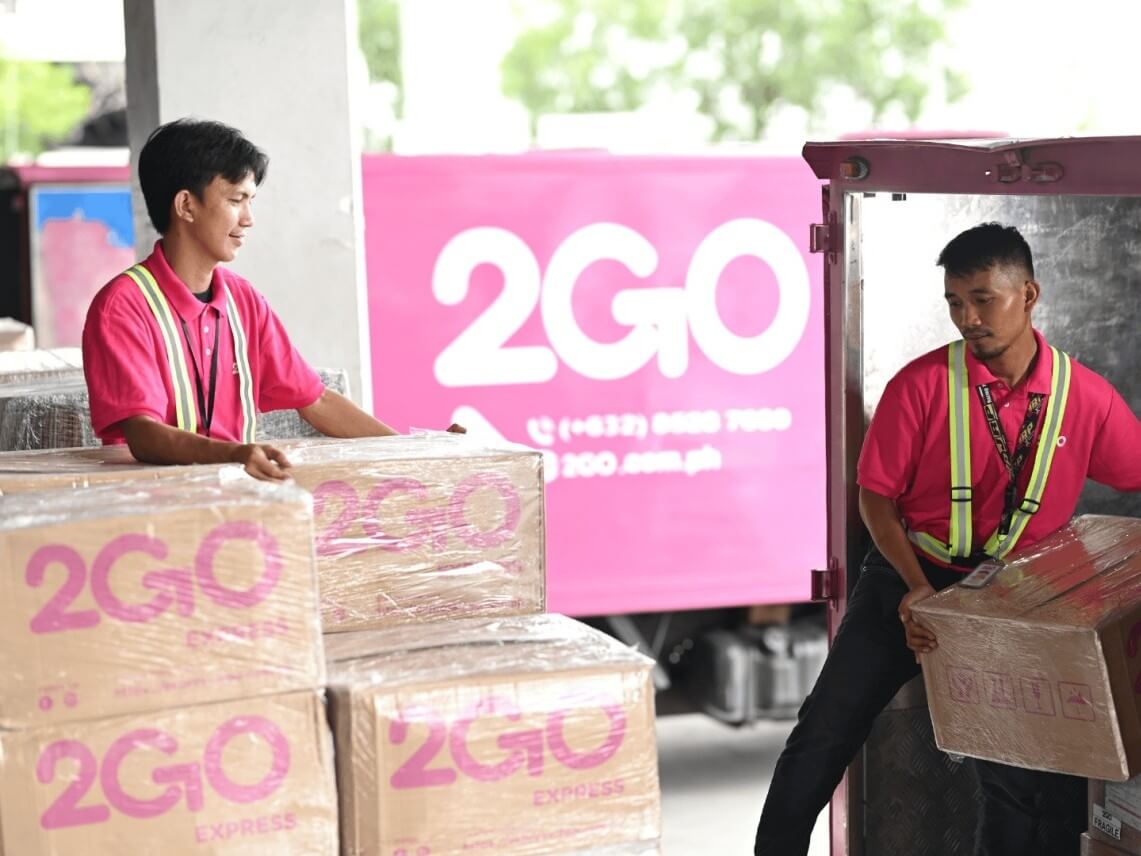 2Go workers move cargo in the logistics firm's distribution facility in this file photo. The SM-led firm is the country's largest logistics operation./Contributed Photo