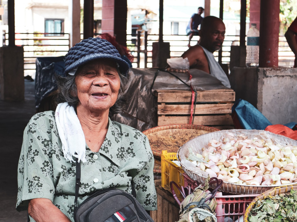 Photo of a market vendor with a warm smile taken by Geri Matthew Carretero during the 2023 Photo Walk./ Contributed photo