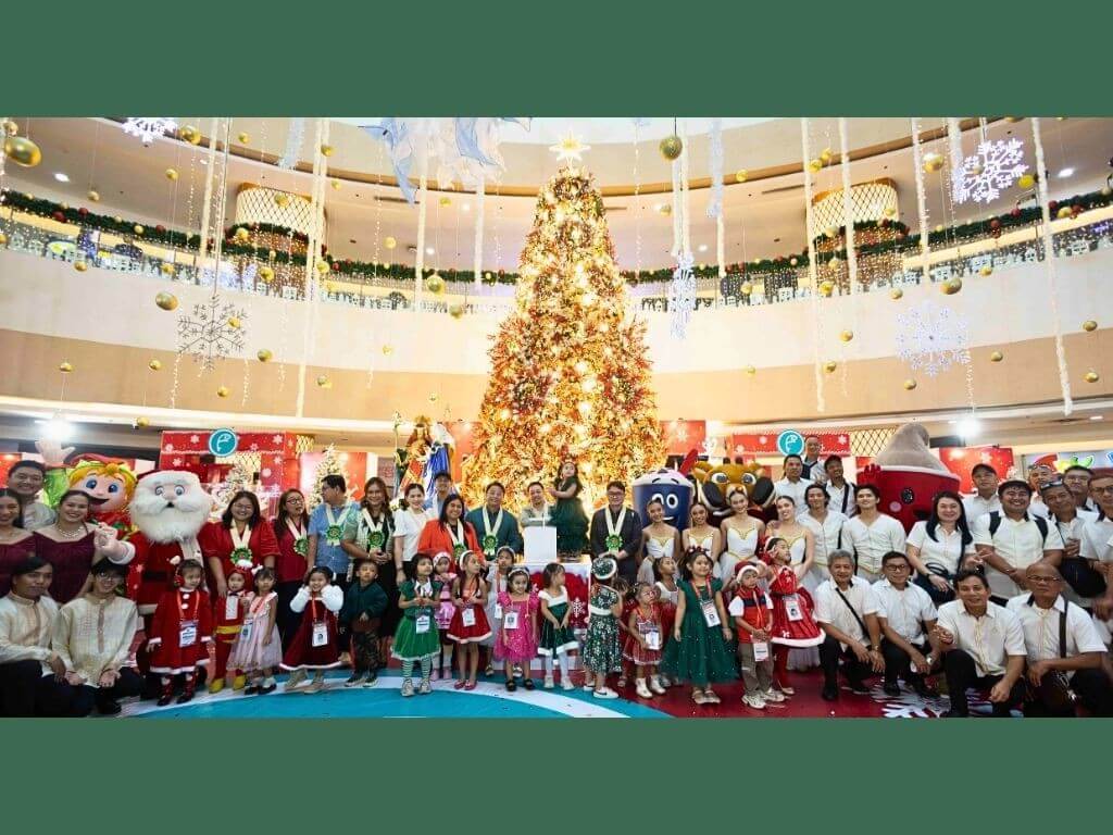 Officials from the Quezon City Government, the Fisher Mall Group of Companies, and performers from Ballet Manila, the Quezon City Symphonic Band, and the Malabon Concert Singers gathered for the Christmas Tree Lighting Ceremony on Nov. 13, 2025. | Contributed photo