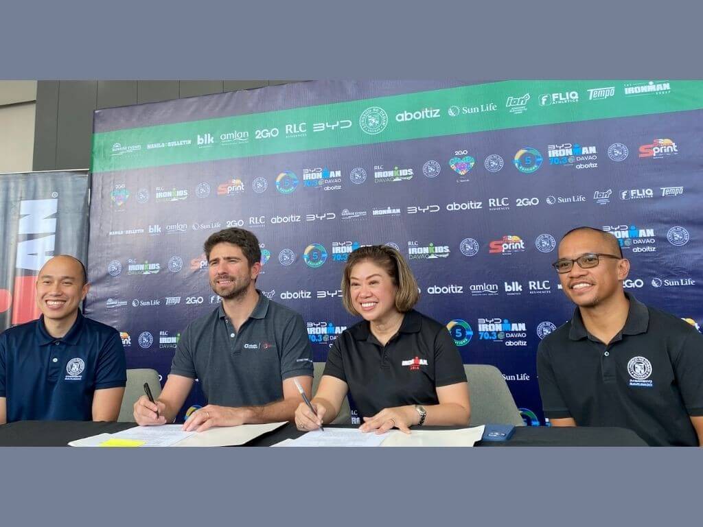 &nbsp;Aboitiz Equity Ventures Synergy Office vice president and Apo Agua Infrastructura president Eduardo Aboitiz and Sunrise Events president and managing director Princess Galura (second and third from left) sign the sponsorship agreement for Ironman 70.3 Davao, as witnessed by representatives from the city government. | Contributed photo