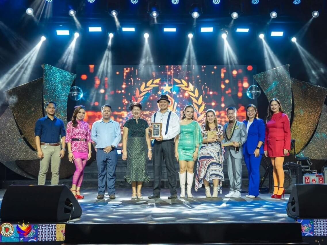 Aboitiz Construction receives the plaque of recognition as Claver, Surigao del Norte’s Top 1 Industry Taxpayer for 2024, honoring its role in driving jobs, revenues, and community growth for the province. | Contributed photo