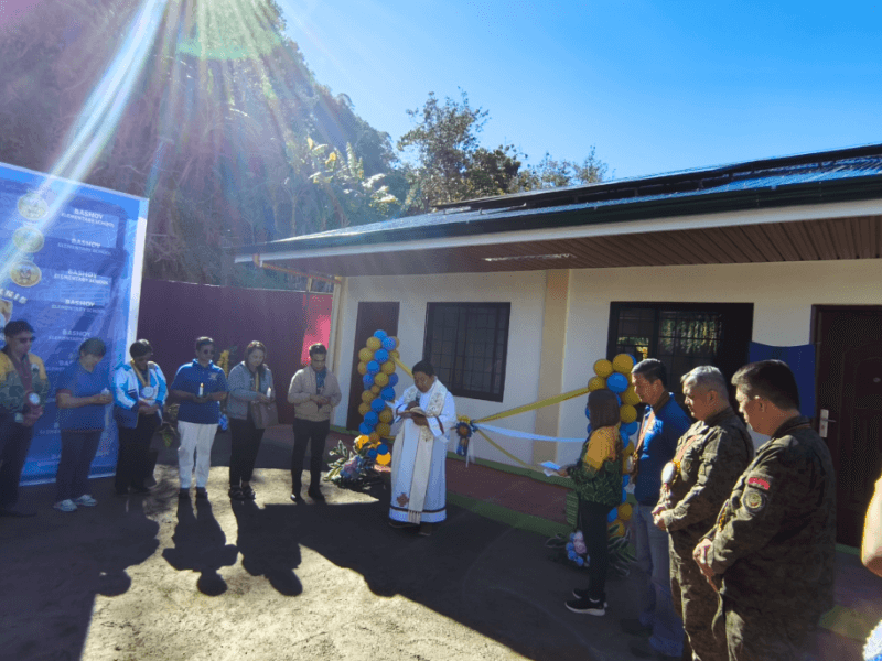Officials from the Department of Education, local government, and the Philippine Army witness the blessing of the new one-classroom building at Bashoy Elementary School in Kabayan, Benguet, now equipped with solar panels and internet connectivity from Aboitiz Foundation. &nbsp;| Contributed photo