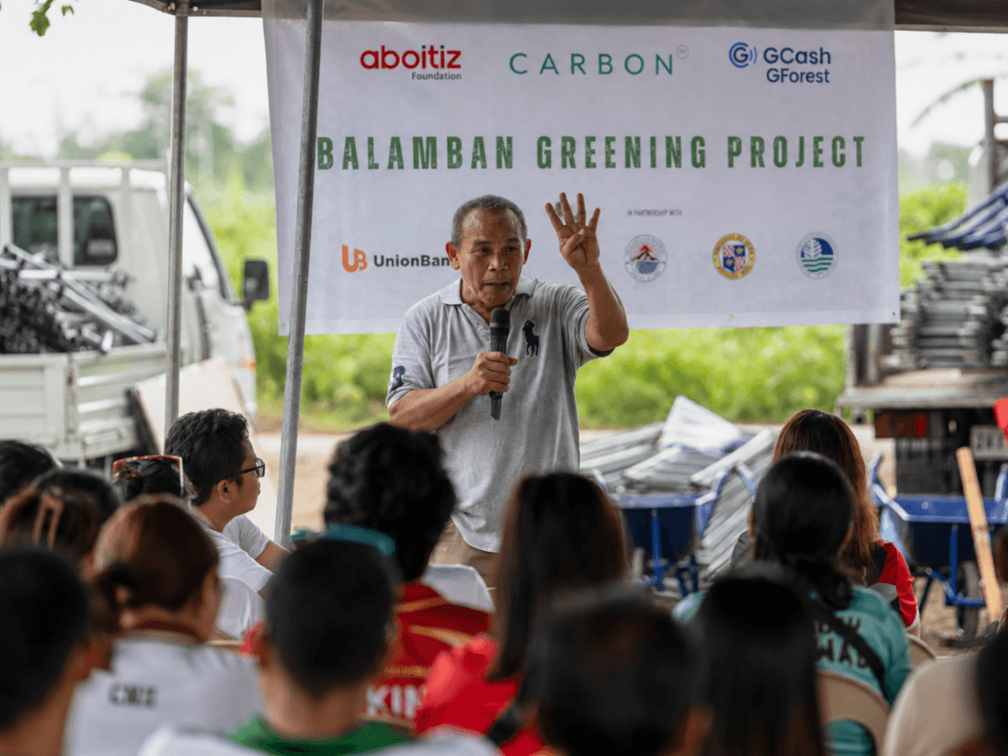Members of the Singsing Tilapia Growers and Farmers Association prepare to support CarbonPH in Balamban, Cebu, following an orientation on nursery establishment and project convergence led by local Disaster Risk Reduction and Management Office head Baltazar Tribunalo. | Contributed photo
