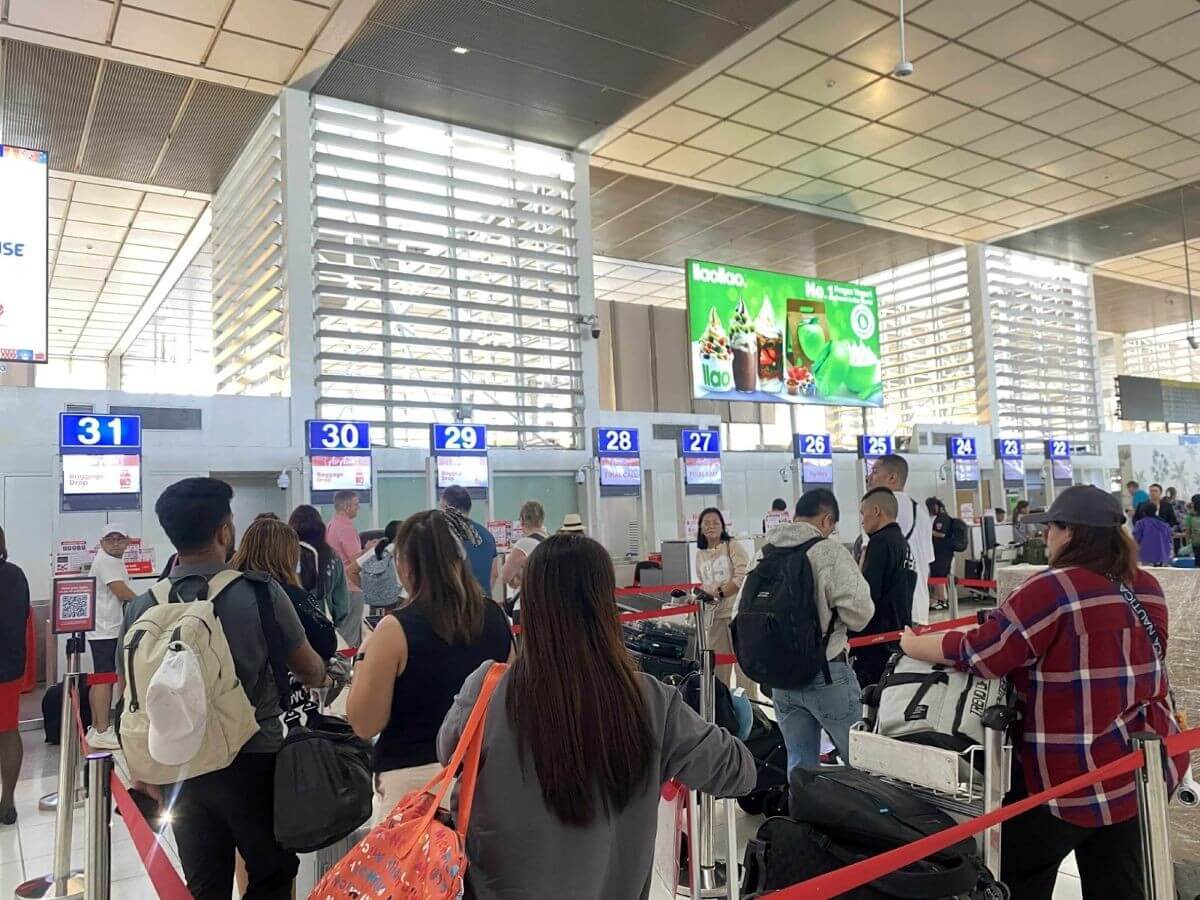 Passengers queue at airport check-in counters as holiday travel picks up ahead of the Christmas rush. | Contributed photo
