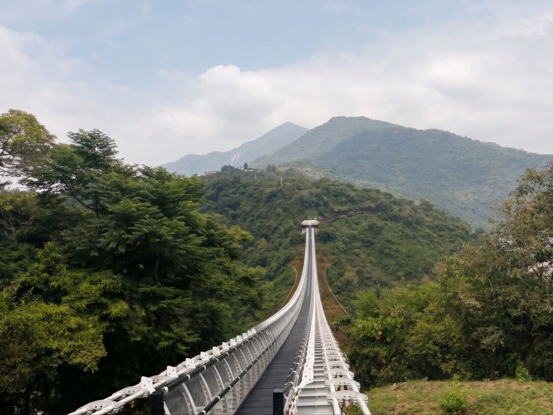 The 262-meter Shanchuan Glass Suspension Bridge in Pingtung offers sweeping mountain views while showcasing glass bead-inspired designs that honor the rich Indigenous heritage of Taiwan&rsquo;s Paiwan and Rukai peoples. | Contributed photo