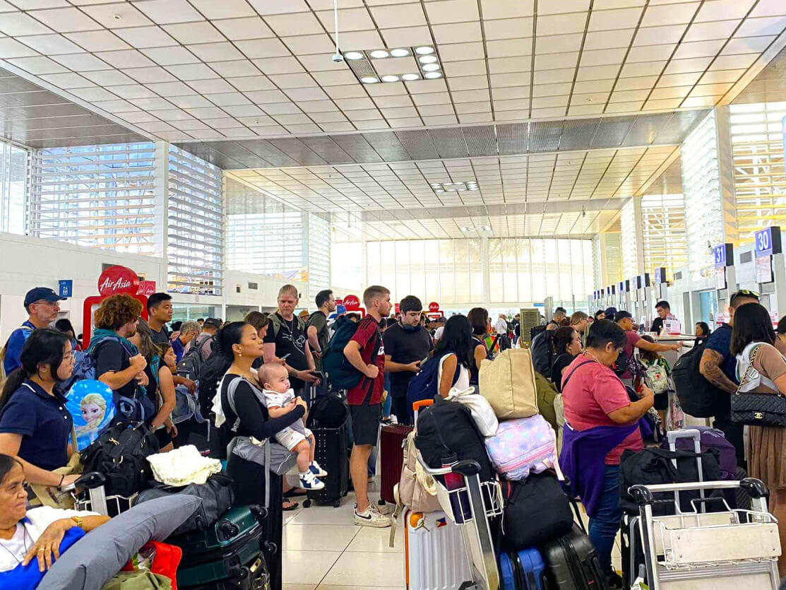 Passengers queue up at AirAsia Philippines' check-in counters at Terminal 2 of the Ninoy Aquino International Airport over the holidays./Contributed photo