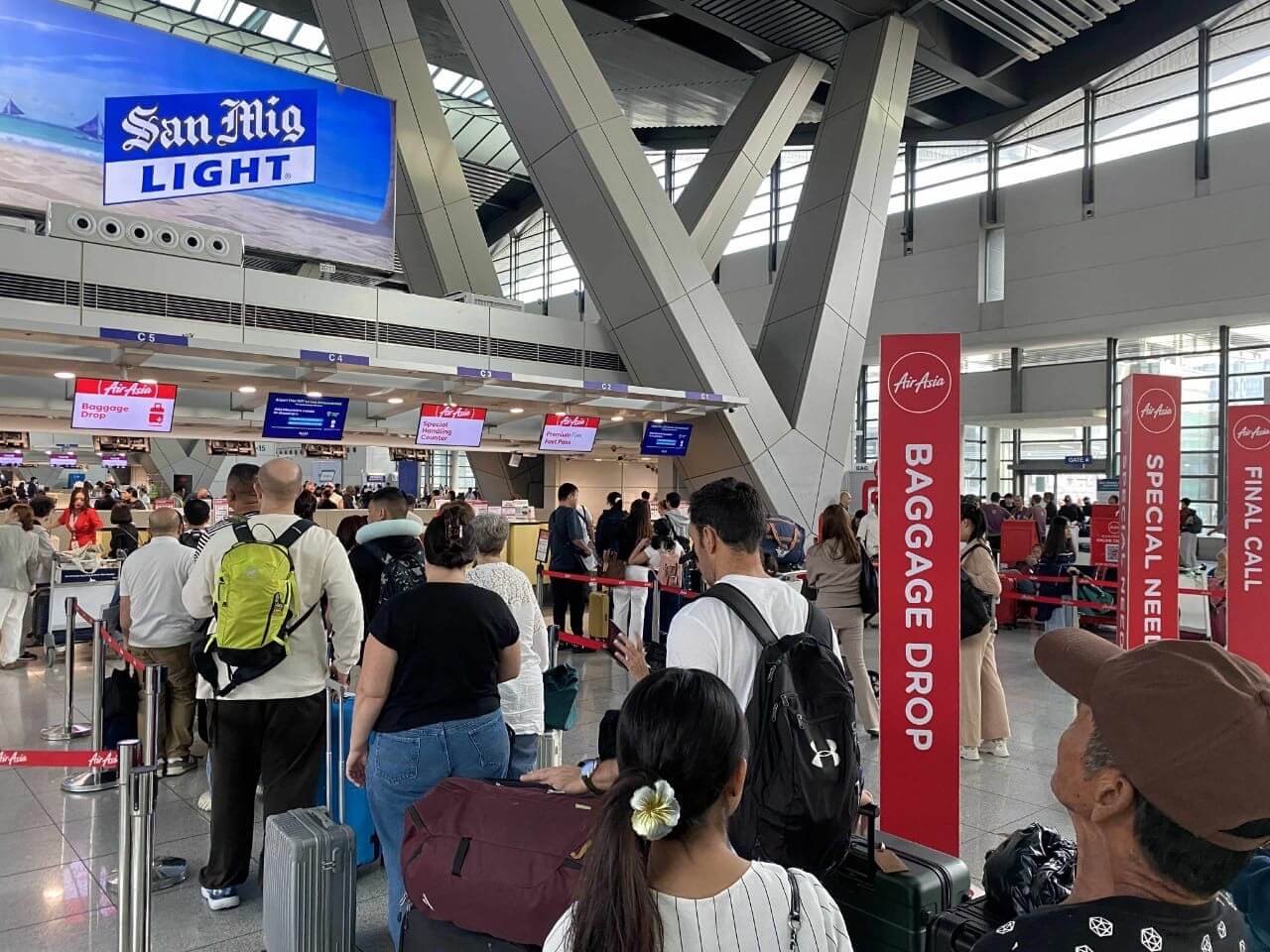 Passengers line up at the airport as AirAsia Philippines kicks off 2026 with up to 27 percent off All Seats, All Flights on select domestic and international routes from Manila and Cebu, giving travelers more reasons to plan ahead and fly further this year | Contributed photo