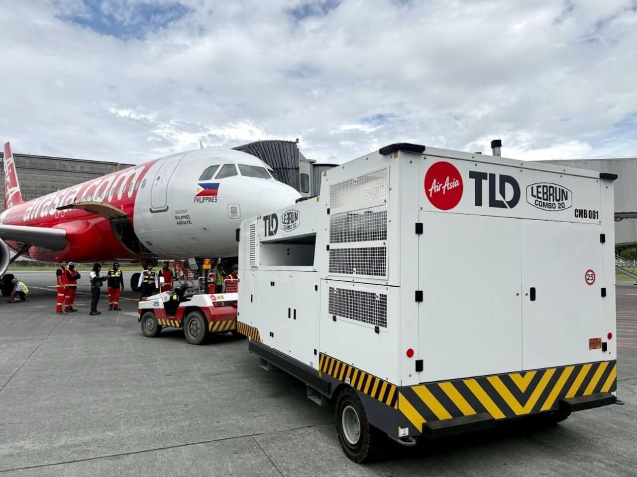 AirAsia Philippines aircraft at NAIA Terminal 3 now uses a new combo unit (ground power and air-conditioning) that reduces emissions by up to 90%, marking the start of greener flights from Manila airport. | Contributed photo