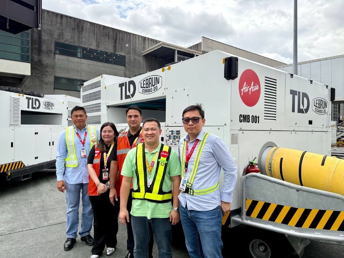 Capt. Suresh Bangah, AirAsia PH CEO (3rd from right) , along with (from left) Capt. Gomer Monreal, director of Flight Operations; Isabel Rebullida, head of Ground Operations; Capt. Alan Roque, chief pilot; and Ryan Cauntay, head of Engineering, recently inspected the newly acquired combo units at NAIA Terminal 3. | Contributed photo
