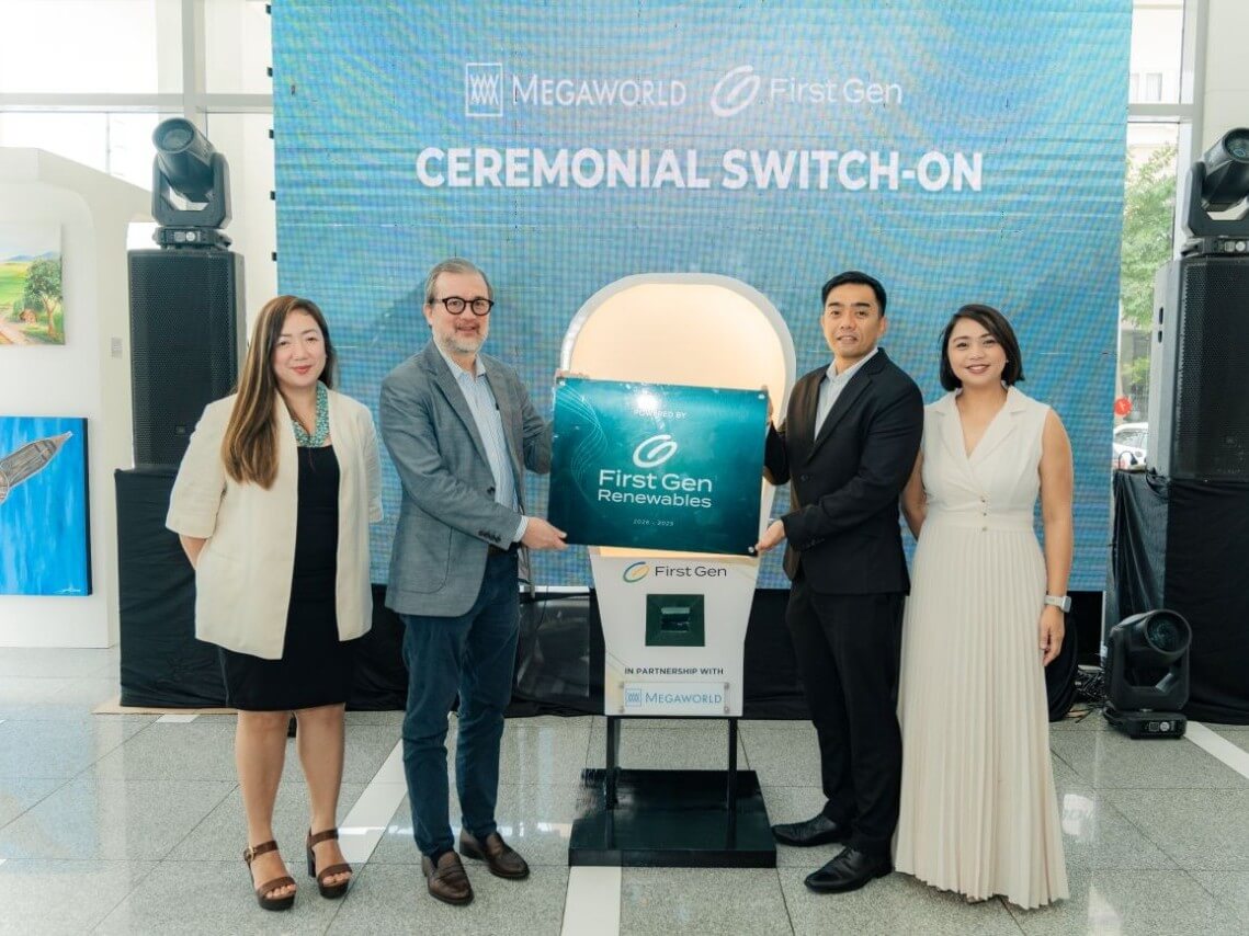 Megaworld global offices head Francisco D. Roxas (second from left) and First Gen chief customer engagement officer Carlos Lorenzo Vega (third from left) lead a switch-on ceremony to mark the transition to renewable energy of key properties and facilities in Metro Manila, Iloilo and Davao of diversified conglomerate Alliance Global Group Inc., Megaworld&rsquo;s parent firm. Also in photo are Maria Christina Tangonan (left), Megaworld senior leasing manager, and Maychelle Soriano, First Gen lead customer progress partner. | Contributed photo
