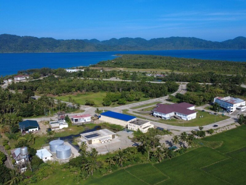 Aerial view of completed and ongoing infrastructure projects within APECO in Casiguran, Aurora, showcasing government buildings, support facilities, and utility systems that form part of the ecozone’s foundational development./ Photo from APECO