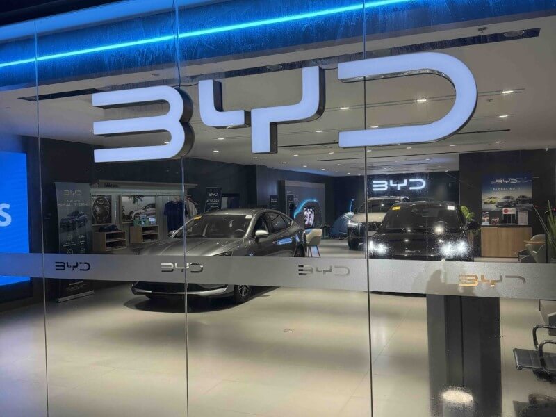 BYD vehicles on display at a showroom in SM North EDSA in Quezon City. Strong demand for the Chinese electric vehicle brand helped drive ACMobility&rsquo;s sales higher in the first half, although rising import costs weighed on profitability./Photo by Miguel R. Camus&nbsp;