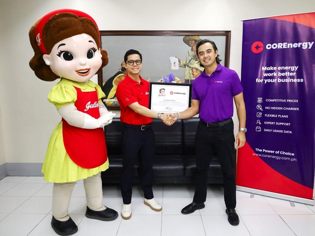 Julies&rsquo; Franchise Corp. COO Gio Gandionco and COREnergy vice president and head of operations Marko Sarmiento seal the partnership with a handshake. | Contributed photo