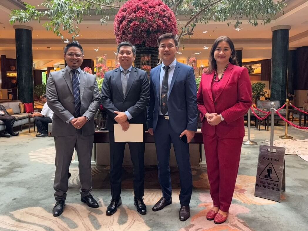 Information and Communications Technology Secretary Henry Rhoel Aguda (left, center) and Bases Conversion and Development Authority (BCDA) President and CEO Joshua M. Bingcang (right, center) discuss collaboration for the National Broadband Plan on the sidelines of the Philippine state visit to India in New Delhi. With them are BCDA Officer-in-Charge for Conversion and Development Group Mark P. Torres (leftmost) and Information and Communications Technology Undersecretary for policy, legal and communications Sarah Maria Sison (rightmost)./ Photo from BCDA
