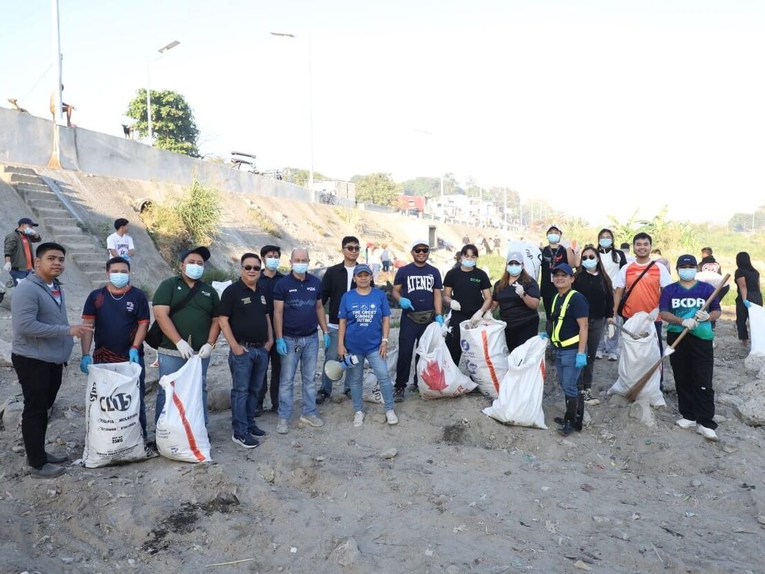 In celebration of National Water Month and World Water Day, BCDA volunteers gathered sacks of waste from the precious waterway, the Abacan River. This initiative is led by the Balibago Waterworks System Inc. | BCDA Photo