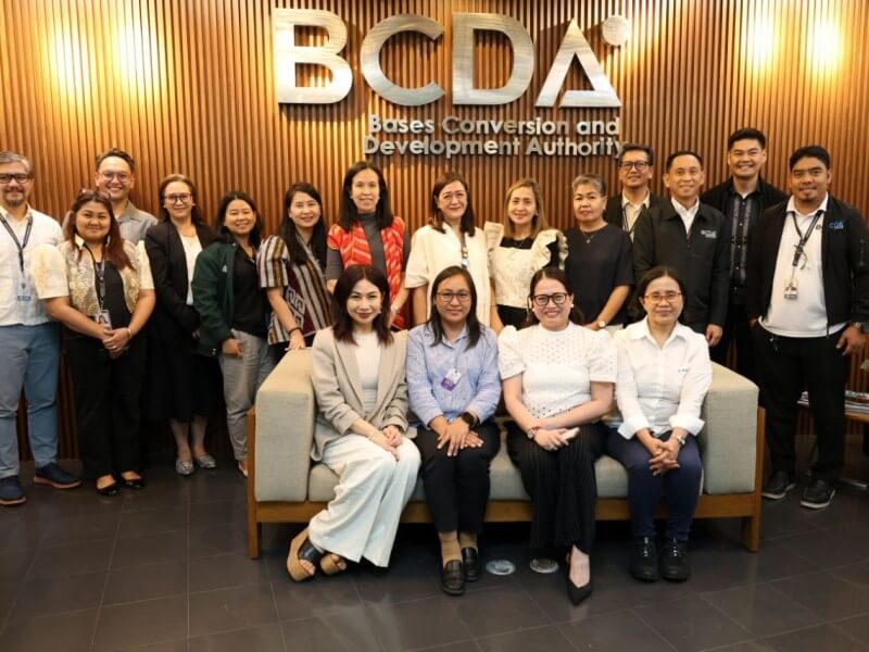TÜV Rheinland lead auditors Rhene Rose Zara (front, second from the left) and Lynn Gerzon (front, rightmost) with the Bases Conversion and Development Authority management, led by executive vice president and chief operating officer Gisela Z. Kalalo (front, 3rd from left) and senior vice president for legal services Diana Joyce N. Basco-Galera (front, leftmost). | Contributed photo (Click to view full image)