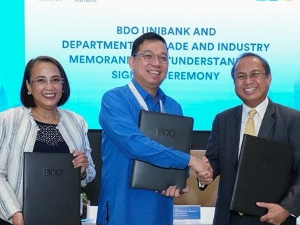 (From Left): DTI's Evariste M. Cagatan, executive director of investments promotion services, and Dr. Ceferino S. Rodolfo, undersecretary and managing head of the Board of Investments, with Charles M. Rodriguez, executive vice president and head of BDO Unibank institutional banking group pose with the signed Memorandum of Understanding (MOU) between BDO Unibank and the Department of Trade and Industry./ Contributed photo