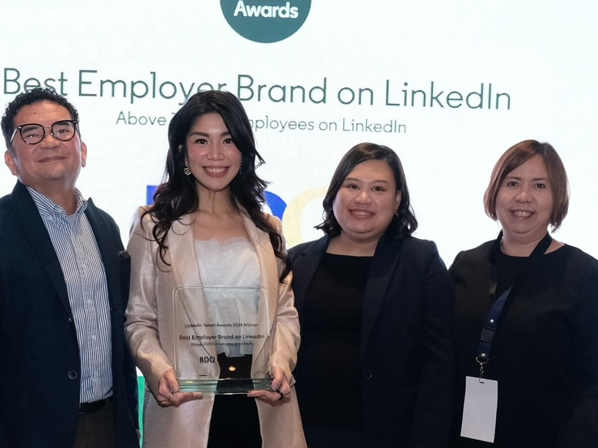 Head of IT & Business Process Association of the Philippines Jack Madrid; BDO vice president-, human resources group, Micheline Vina J. Pe Lim; BDO senior AVP, huma resources group, Tanya V. Cusi; and BDO VP, human resources group, &nbsp;Mary Ann L. Alcalde pose for a group photo during the LinkedIn Talent Awards./Contributed photo