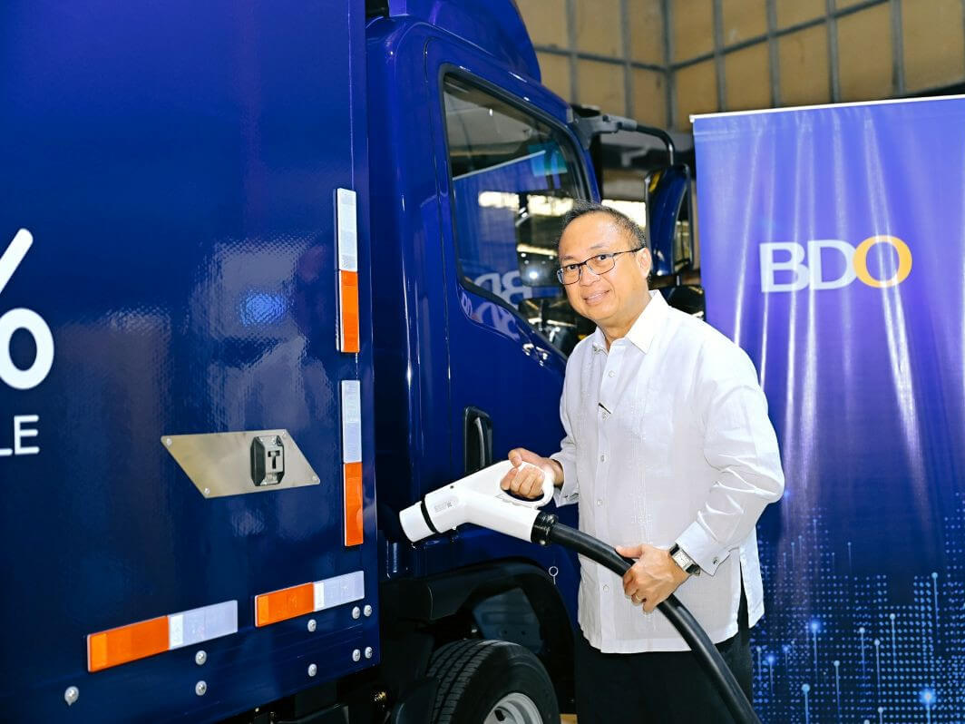 BDO’s Charles Rodriguez powers up one of the electric trucks funded by BDO at the launch of Mober Central Charge, strengthening BDO’s support for eco-friendly mobility in the country./ Photo from BDO