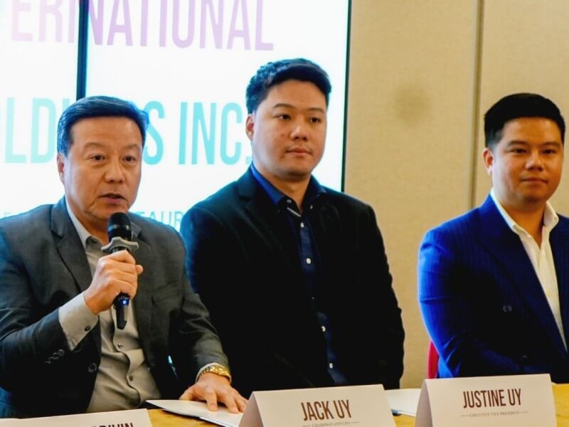 Savers Group chair Jaime “Jack” Uy speaks to the media after the agreement signing. With him are company president and COO Jansen Ivan Uy, and EVP Justine Shaun Uy./ Contributed photo