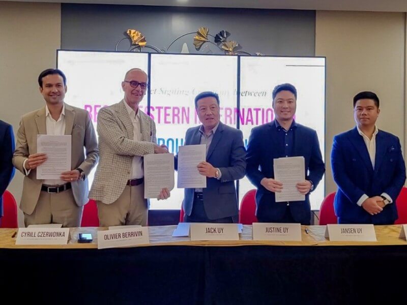 Best Western vice president for Asia Pacific Olivier Berrivin and Savers Group chair "Jack" Uy shake hands after signing the Developer Agreement. With them are Best Western managing director for operations Rodney Simpson, managing director for development Cyrill Czerwonka, Savers Group president and COO Jansen Ivan Uy, and EVP Justine Shaun Uy./ Contributed photo (Click the photo to view the full image)