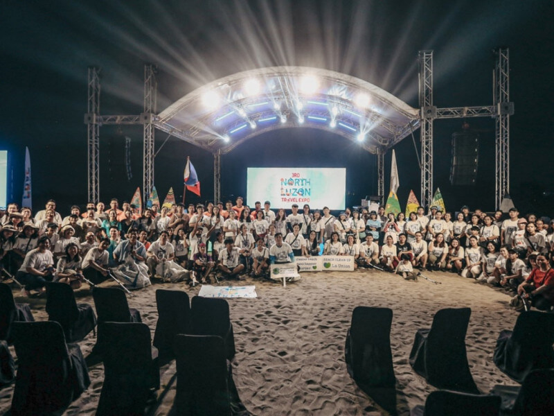 Security Bank and CURMA unite over 220 volunteers to clean the shores of San Juan, La Union during the North Luzon Travel Expo./ Contributed photo