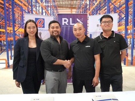 RLX head of leasing Jubie Anne Vallarta, RLX AVP Jay dela Cuara, Bi-Chain PH Corp. CEO Yu ChangJun, and Bi-Chain PH warehouse manager Derek Jiang./ Contributed photo