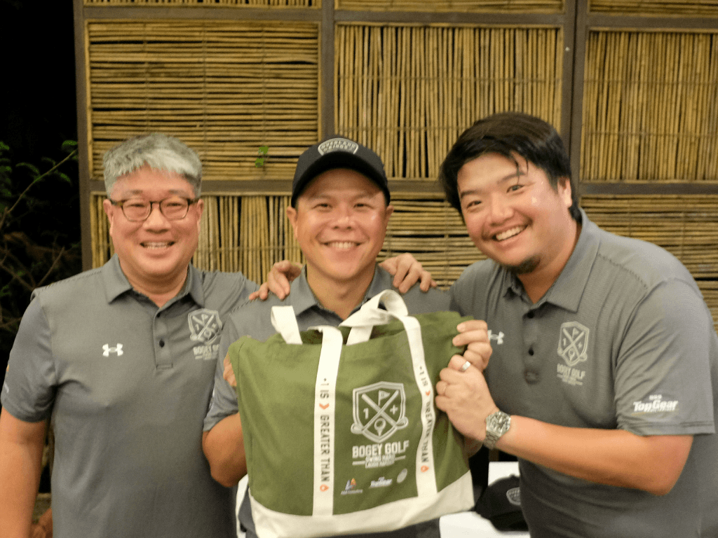 The tournament's organizers (left to right) A&A Consulting&rsquo;s Spencer Yu, Overland Kings&rsquo; Joel Conrad Pedro, and Top Gear Philippines&rsquo; Carlo Chungunco./Contributed Photo