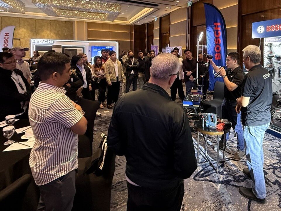 Bosch power tools brand manager Jonathan Tanangco and key user specialist Romeo Juguan lead a hands-ondemonstration during Bosch Builders Day Manila. | Contributed photo