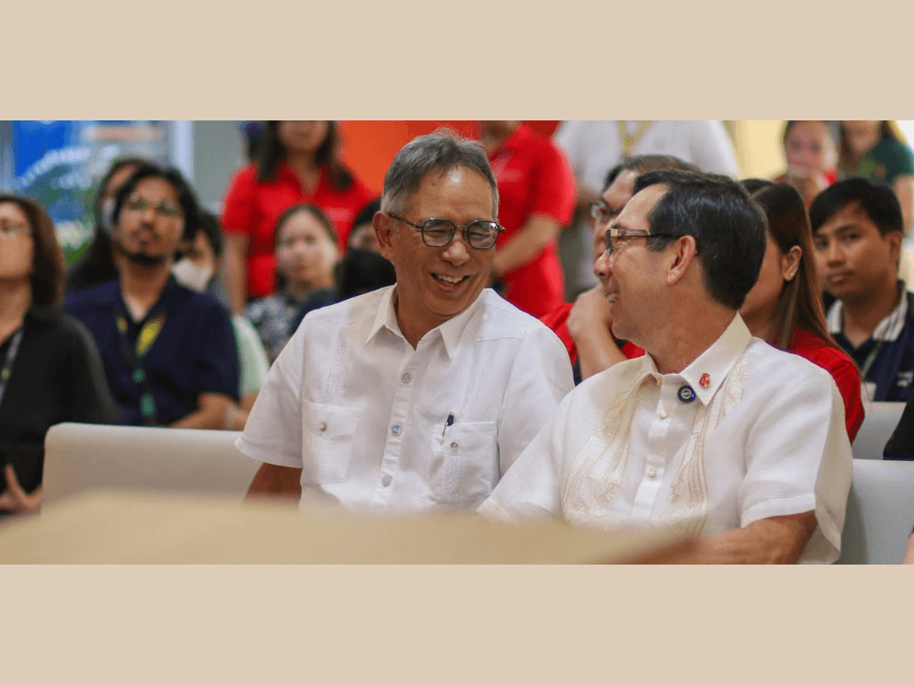 TG Limcaoco (right), BPI president and CEO, shares a light moment with Aurelio Montinola III, FEU chair. | Photo from FEU Tech Innovation Center