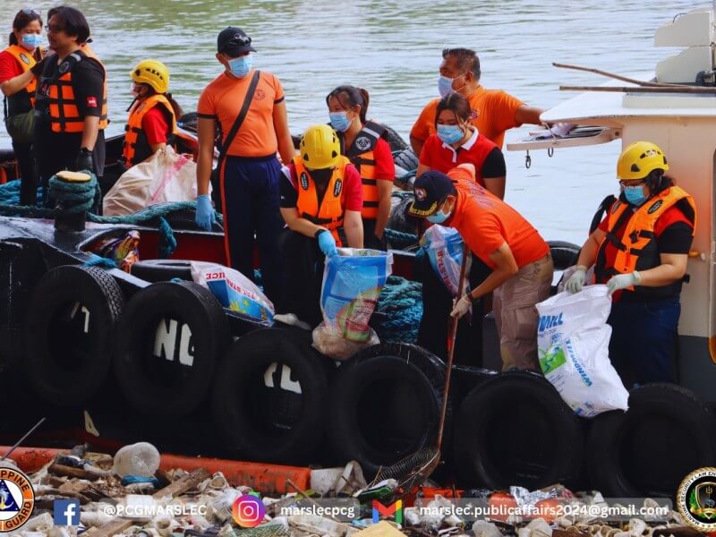 Volunteers from BPI and the PCG collect waste from the Pasig River, reaffirming their shared commitment to environmental protection and community resilience. | Photo from the Philippine Coast Guard
