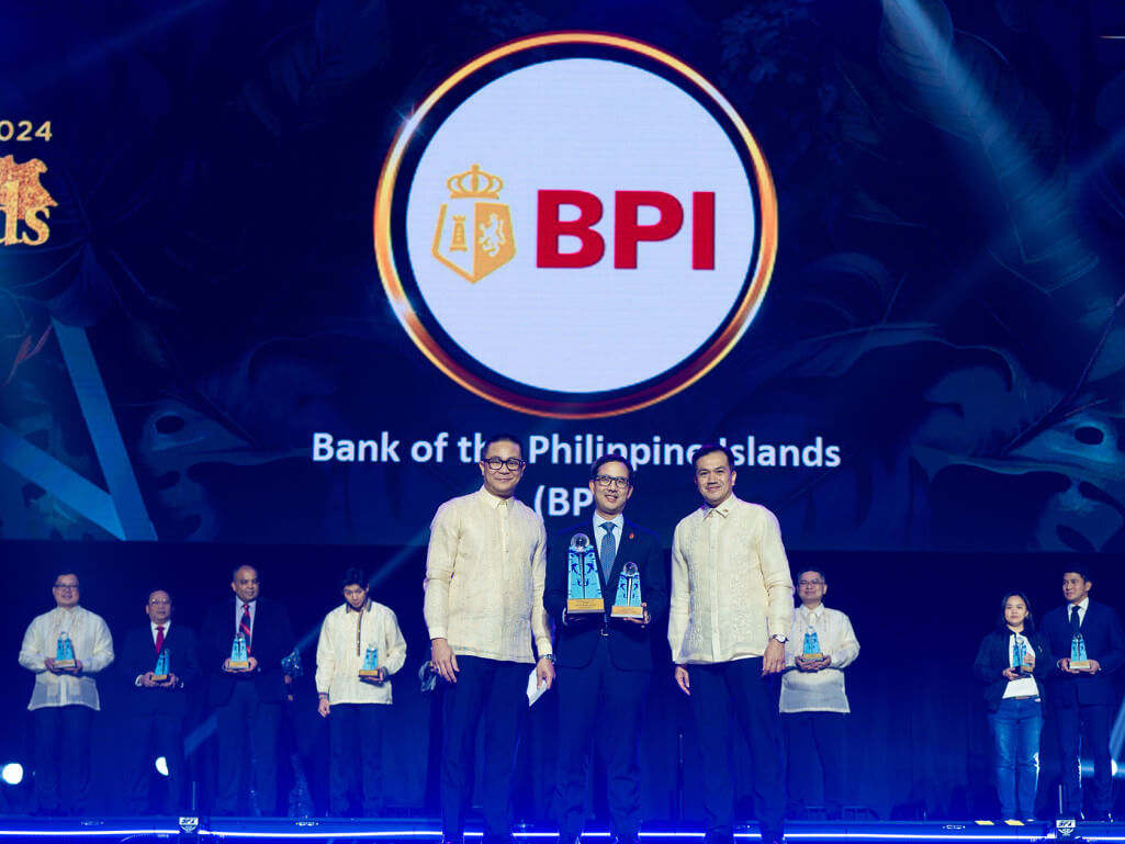 Eric Luchangco, BPI CFO and chief sustainability officer (center), receives the“Sustainability Company of the Year” award for BPI. With him are Chito Bauzon, Maybank Philippines head of stakeholder management & marketing (left) and Patrick Dennis Solosa, Maybank Philippinespresident and CEO (right).
