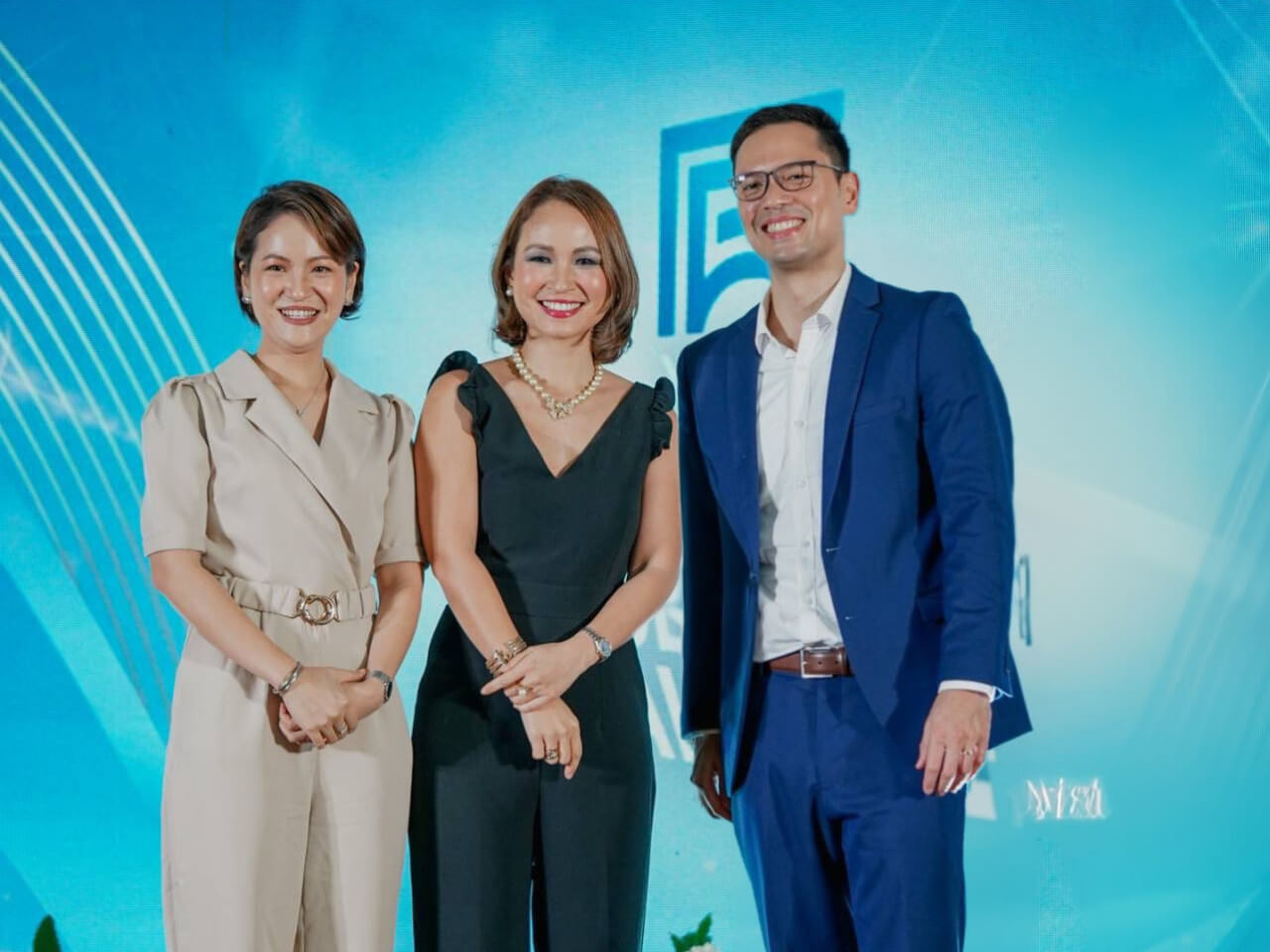 Top Line Business Development Corp. celebrated its 11th Anniversary on July 12, 2024. From left to right: Atty. Constance Marie C. Lim, First Vice President and Chief Financial Officer; Brigitte Carmel C. Lapasaran Lim, Senior Vice President, Chief Operating Officer, and Corporate Secretary; and Eugene Erik C. Lapasaran Lim, Chairman, President, and CEO.