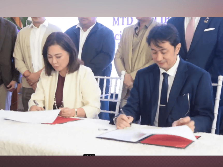 Cebu Gov. Pamela Baricuatro and Engr. Patrick Nicholas David, CEO and president of MTD Philippines Inc., sign the memorandum of understanding at the Capitol Social Hall on May 19, signaling the start of the feasibility study for the proposed integrated government and economic center in Naga City, Cebu. | Contributed photo