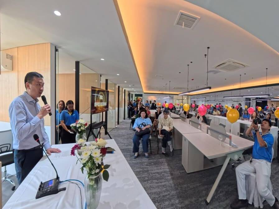 Kenneth Go, president and CEO of Visayan Surety Insurance Corp., addresses employees, brokers, and partners during the inauguration of the company&rsquo;s new head office at Kepwealth Center in Cebu Business Park. | Contributed photo