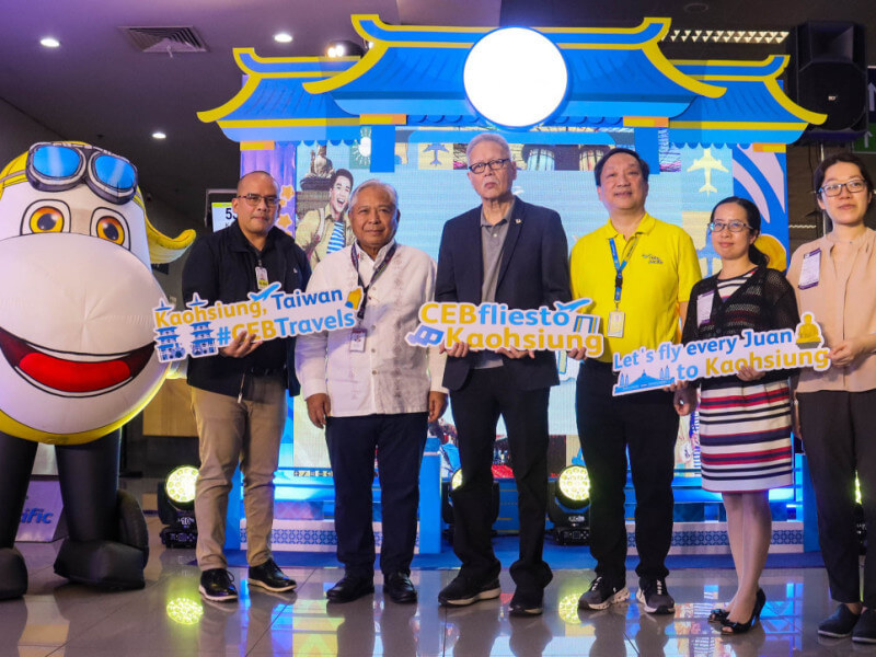 DOTr Secretary Bautista (center) leads the cake-cutting ceremony to officially mark the relaunch of Cebu Pacific Manila-Kaohsiung route. From left: Taiwan Economic and Cultural Office representatives Donna Hung and Sophia Chi; Manila International Airport Authority head executive assistant Atty. Chris Bendijo; Cebu Pacific Chief Corporate Affairs Officer Michael Ivan Shau; Civil Aeronautics Board Executive Director Atty. Carmelo Arcilla. (Photo courtesy of Cebu Pacific) 