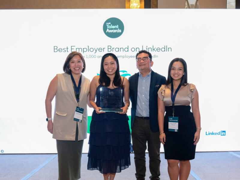 From Left: CEB Director for Talent Management Chrissie Perfecto, Aira Dizon of CEB Employer Branding team, IT & Business Process Association of the Philippines President and CEO Jack Madrid, and KC Palermo of CEB Learning and Development team during the awarding of Best Employer Brand to CEB at the LinkedIn Talent Awards 2024. (Photo courtesy of Cebu Pacific) 