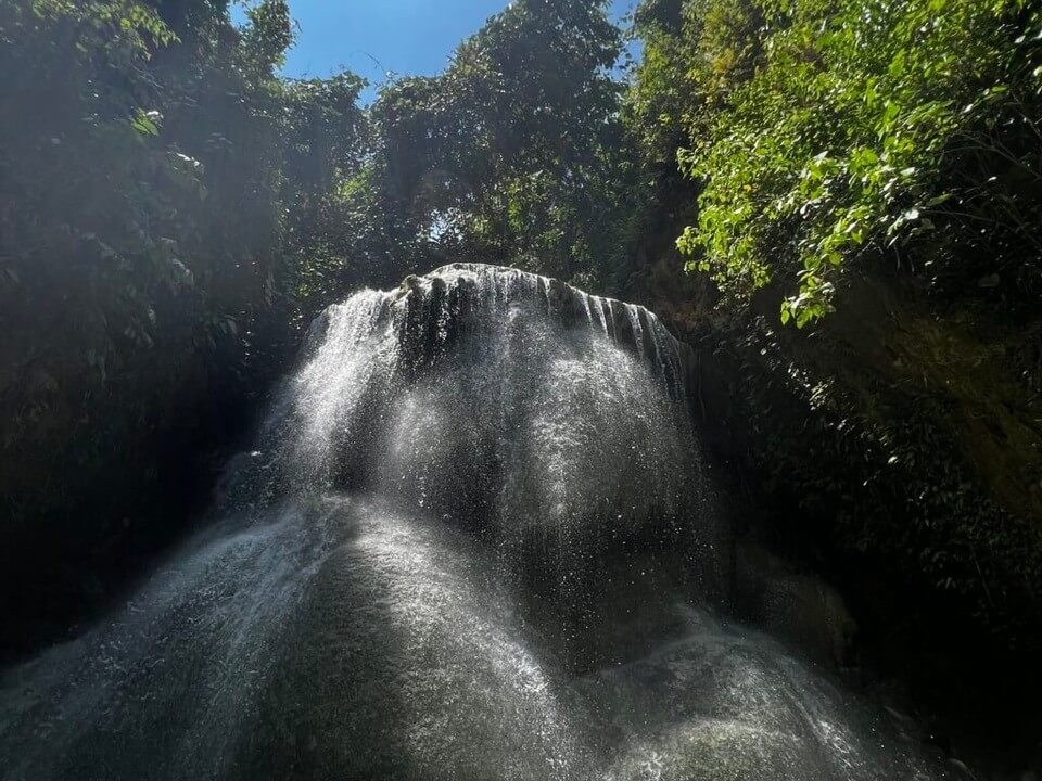 One of Samboan&rsquo;s most popular destinations, Aguinid Falls is a multi-tiered waterfall in Barangay Tangbo, Cebu, known for its distinctive step-like cascades that allow visitors to climb up the falls themselves. | Photo from the Cebu Provincial Tourism Office.