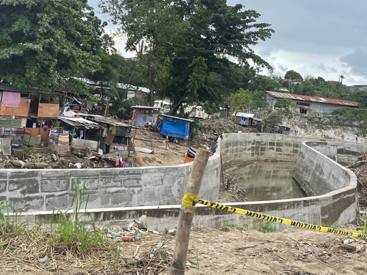 One of the dikes that were damaged at the height of typhoon &ldquo;Tino&rdquo; has been repaired. A portion of the dike in Barangay Casuntingan, Mandaue City, collapsed during the typhoon, causing floods in nearby areas. The Regional Development Council wants the Department of Public Works and Highways to integrate nature-based solutions rather than just dikes such as this in infrastructure projects. | Photo by Connie Fernandez-Brojan