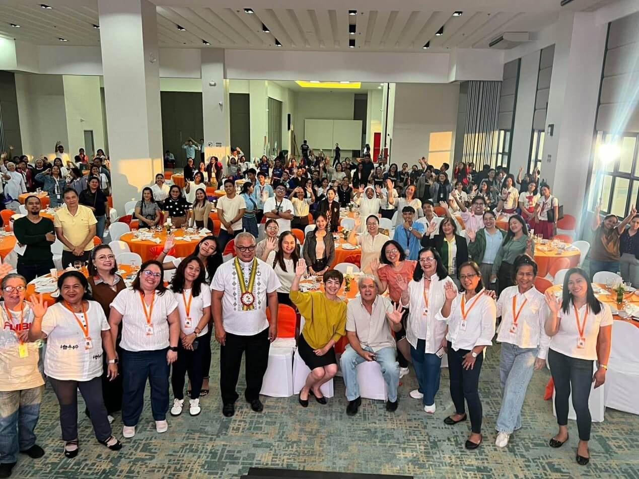 Educators from Cebu Province and Negros Oriental join The Human Project Foundation organizers, led by Caroline Ballesteros-Pilapil and Joshua Pilapil (seated, center), for a group photo at the conclusion of the Project 12 Summit. | Contributed photo