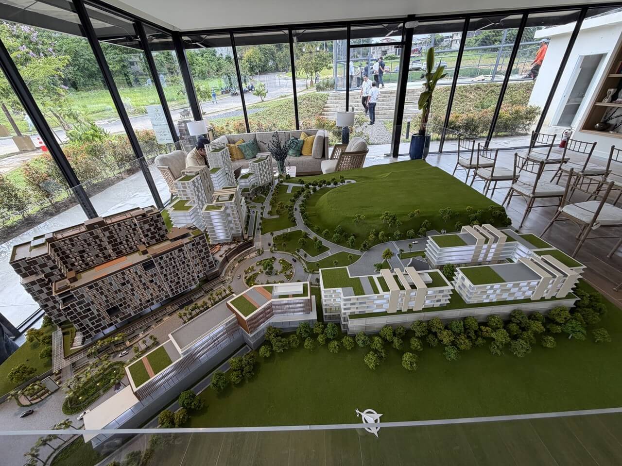 A diorama of Pristina Town is displayed inside The Veranda, the visitor center and showcase hub for North Grove. Adjacent to The Veranda are the township's pickleball courts.| Photo by Connie Fernandez-Brojan