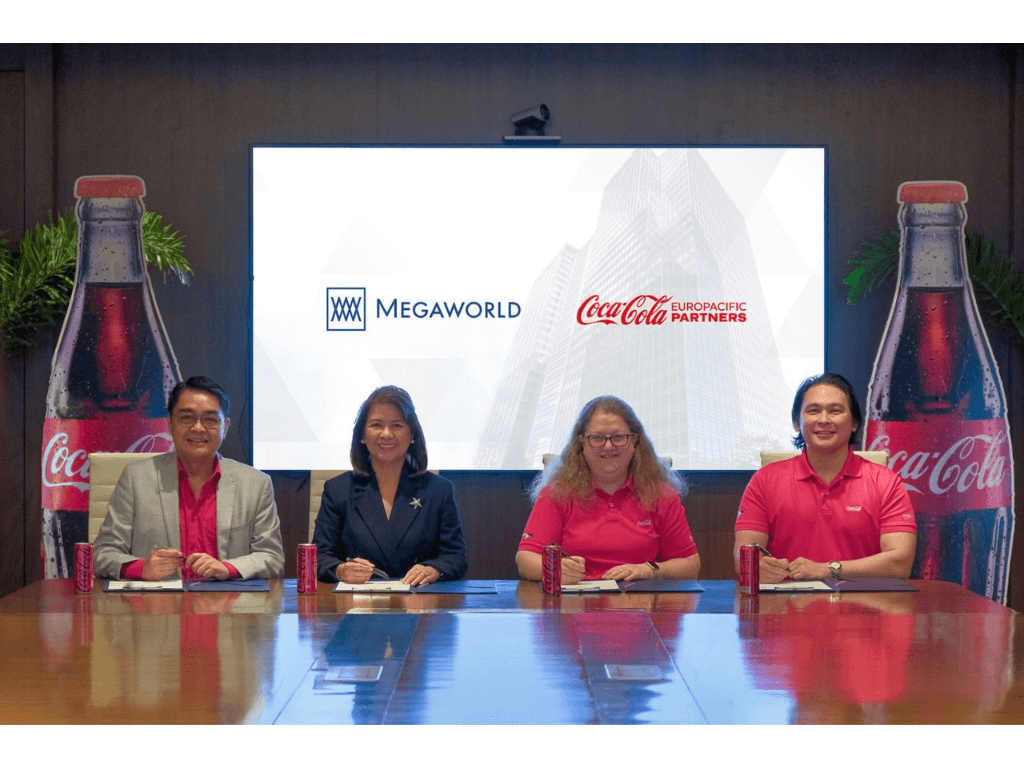 Coca-Cola and Megaworld officials seal the deal for the Fotune 500 firm's new offices in Uptown Bonifacio./Contributed Photo