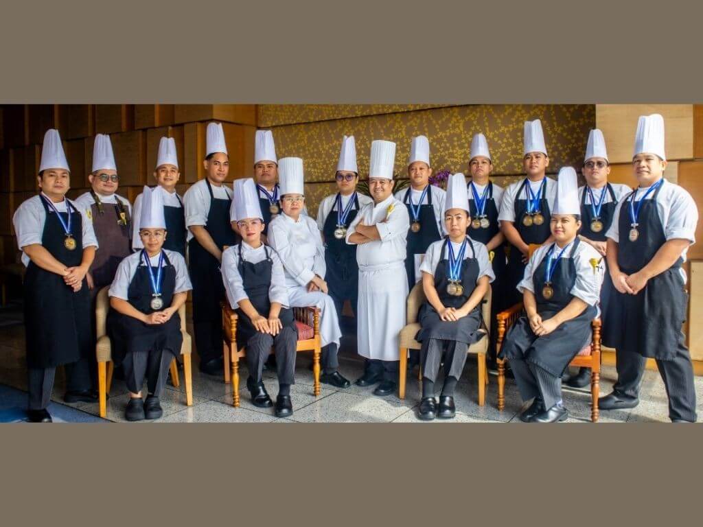 The winning chefs: (Front, from left): Doreene Ien Mae Valencia, Rebecca Sy, Patricia Mesina (executive sous chef), Aguido Lindayag (executive pastry chef), Kryshiel Acidera, and  Arlene Tapiador (Back, from left): Joseph Ledesma, Jefferson Francia, Aeron Christian Natividad, Chad Allen Purugganan, John Christian De Guia, Maria Richelle Ann Constantino, Bencent Chiquito, Charles Palermo, Andrian Buizon, Kevin Borbon,  and Antonio Dolido III./ Contributed photo (Click to view full image)