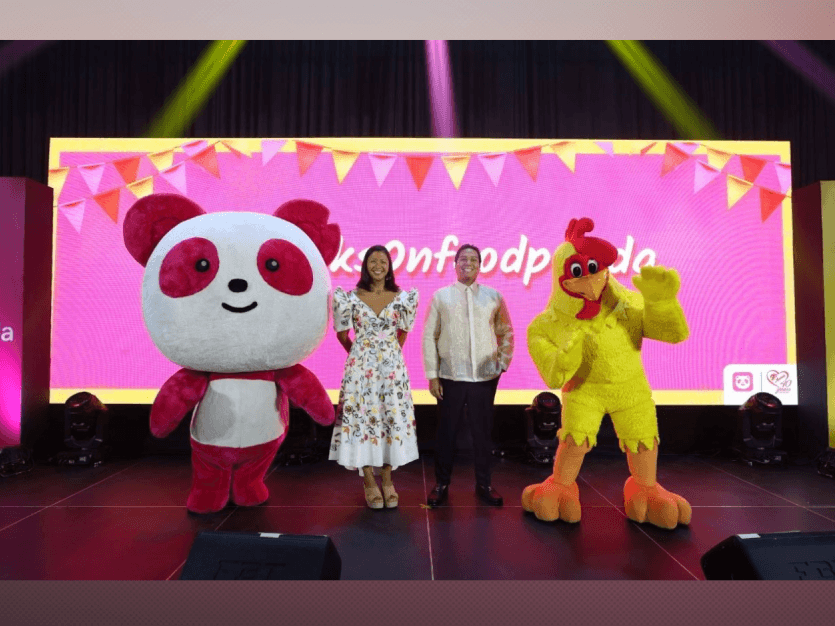 foodpanda Philippines marketing and growth director Patricia Jacinto and Andok's Litson Corp. president Maverick Leonardo T. Javier mark the partnership during the Pista ng Sarap event. | Contributed photo