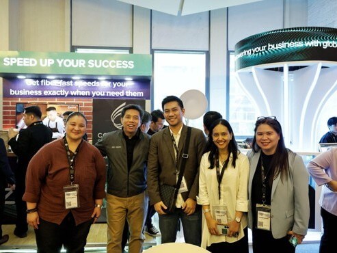 The SME Group posed with Information and Communications Technology Secretary HenryAguda at their promotional booth during the two-day event. | Contributed ​photo