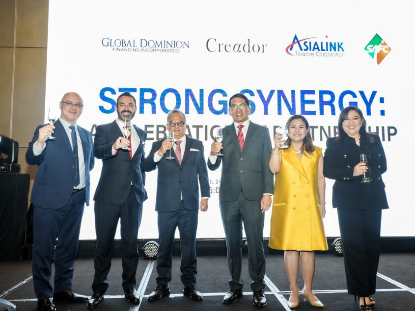 PARTNERSHIP SEALED. Officials from Creator and Asialink toast their plans and outline their goals for the future. Standing from left are Joel Cruz, president and managing director of South Asialink Finance Corp.; Omar Mahmoud, managing director of Creador; Ruben Lugtu II, Asialink chair; Robert Jordan, Jr., Asialink CEO; Patricial Poco-Palacios, president and managing director of Global Dominion Financing Inc.; and Eillen Mangubat, Asialink president and COO.