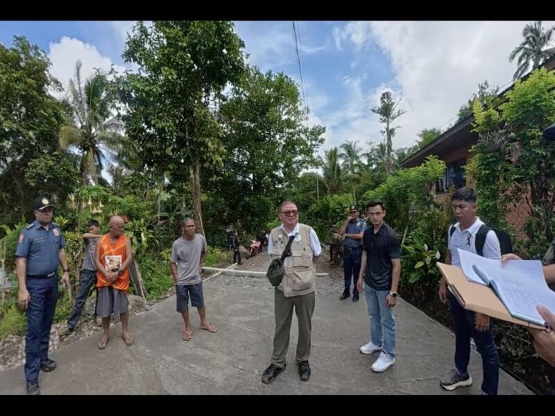 Officials inspect a farm-to-market road project in Davao. | Photo from the DA
