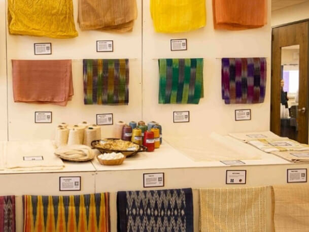 Handwoven fabrics, including T’nalak, Piña seda, Kantarines, Pinilian, Kankanaey, Hablon, and Pigi, crafted by Indigenous communities and local artisans from various regions in the Philippines, are on display at Hayward Hall. QR codes accompany each textile, allowing visitors to explore the unique origins and cultural significance of each weaving tradition./ Photo by PTIC-NY