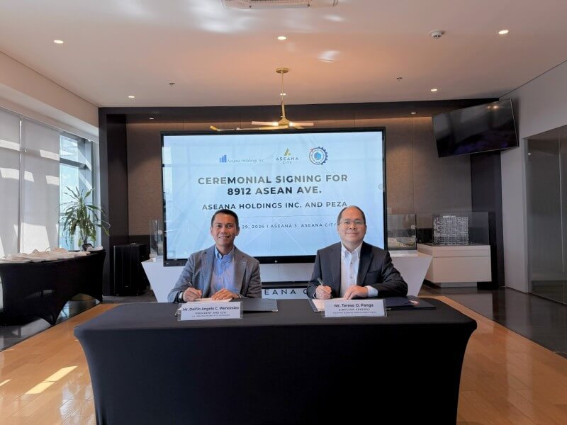 Delfin Angelo C. Wenceslao, CEO of DMW, and Tereso O. Panga, Director General of &nbsp;PEZA, during the ceremonial signing for the PEZA registration of 8912 Asean Ave | Contributed photo