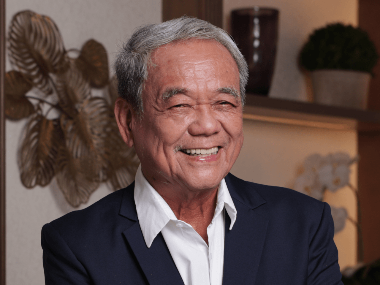 Isidro A. ConsunjiChair and president, DMCI